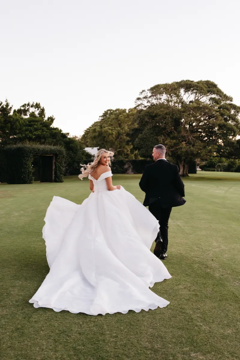 Lauren and Daniel on the lawn at Sandstone Point.